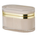 Elegant glasbox med mässingsdetalj – nude